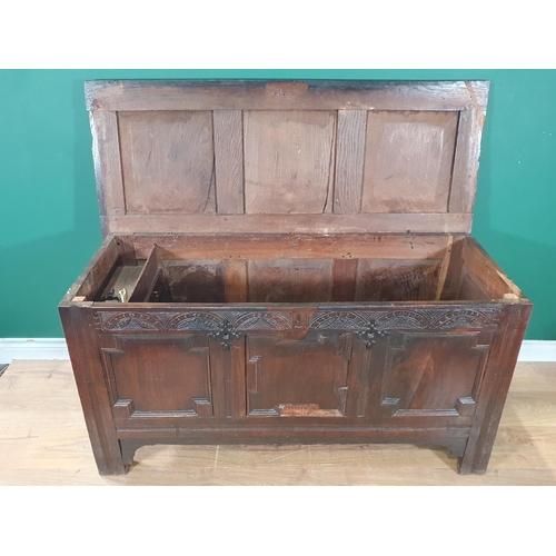 593 - A 17th Century oak Coffer with sunken three panel lid above geometric moulded front 4ft 3in W x 2ft ... 