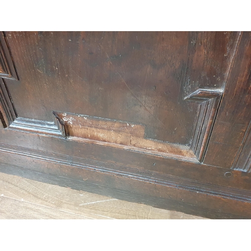 593 - A 17th Century oak Coffer with sunken three panel lid above geometric moulded front 4ft 3in W x 2ft ... 