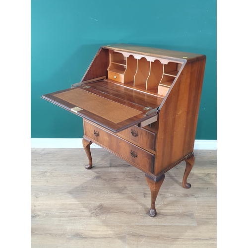 597 - A walnut veneered Bureau on cabriole supports 3ft 3in H x 2ft 6in W and a glazed oak Corner Cupboard... 