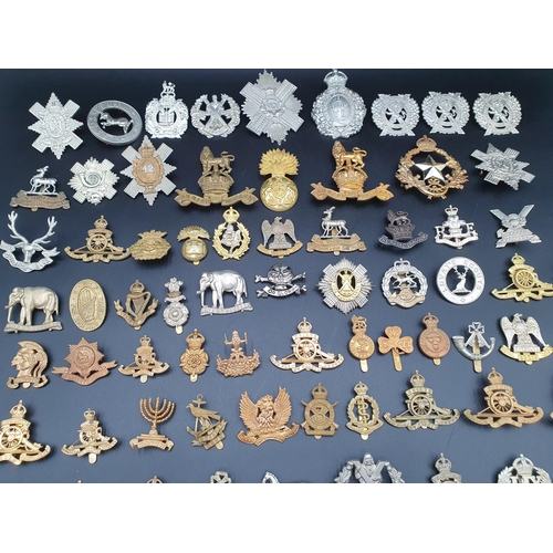 60 - A Collection of approx 100 Military Badges