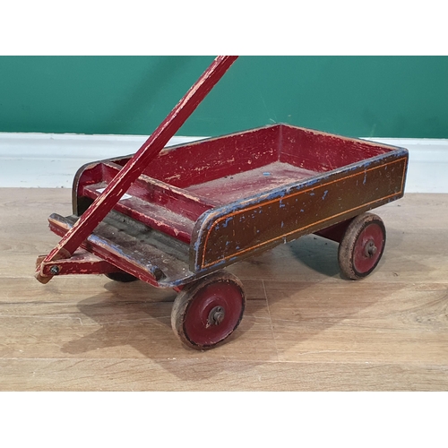 601 - An antique painted wooden children's Hand Cart 1ft 7in L x 6 1/2in H (R6)