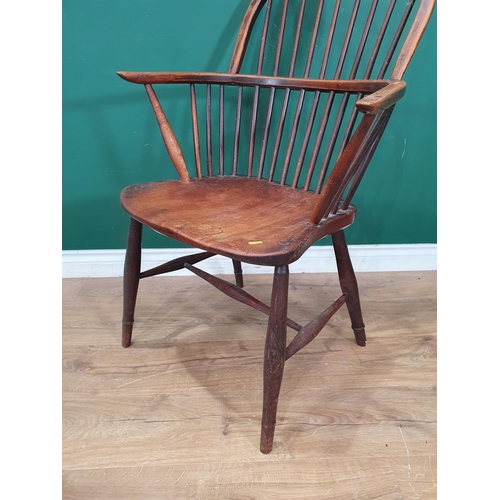 608 - An antique ash and elm Windsor Elbow Chair on turned supports and H-stretcher 3ft 2in H x 2ft 1in W ... 