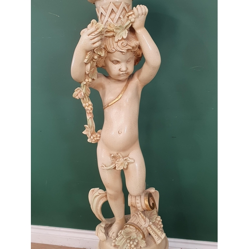 619 - A modern Jardinere with cherub support on circular base with scroll supports 4ft 6in H x 1ft 4in D (... 