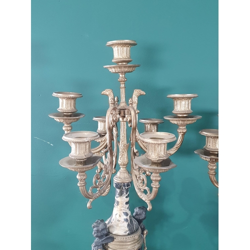 637 - A pair of French style Candelabra with gilded metal sconces and polished stone column and angel hand... 