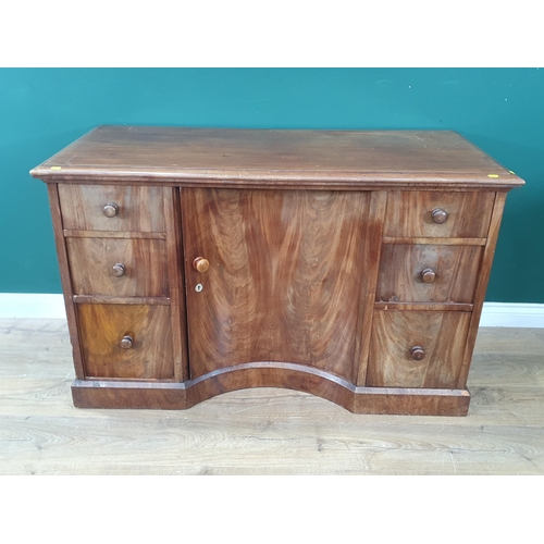 647 - A Victorian mahogany Desk fitted six drawers flanking concave cupboard door 4ft 1in W x 2ft 7in H (s... 