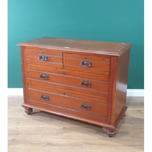 656 - An oak oak Chest of two short, two long Drawers on turned bun feet, 2ft 9