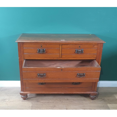 656 - An oak oak Chest of two short, two long Drawers on turned bun feet, 2ft 9