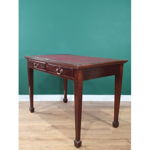 659 - A reproduction mahogany Writing Table with inset writing surface, above pair of fitted drawers, rais... 