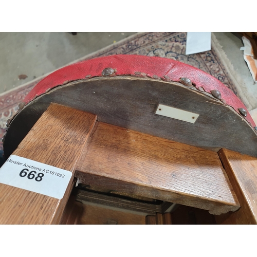 668 - A pair of green upholstered Industrial Stools, and another red upholstered Stool. (R8).