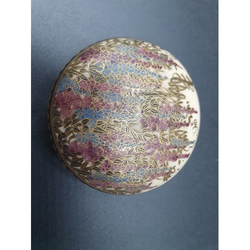 68 - A late 19th Century Japanese Satsuma circular shallow Box and Cover finely painted flowering shrubs ... 