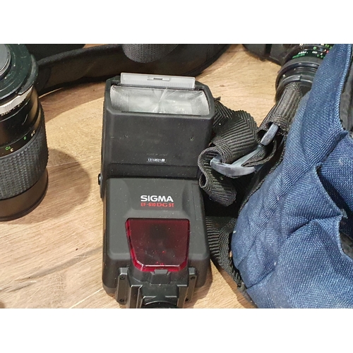 708 - A quantity of Cameras and accessories including A Canon AT-1, a Pentax P30n, a Helina Perfect twin L... 