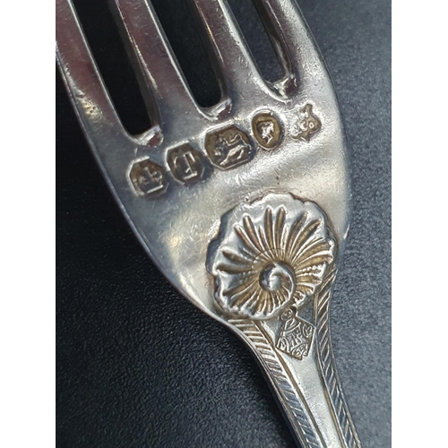 97 - A Victorian silver ornate Knife, Fork and Spoon, Sheffield 1858, 61 and 69, two small Forks and a Co... 