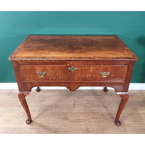 454 - An antique walnut veneered Side Table fitted single frieze drawer on cabriole supports and pad feet ... 