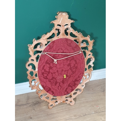 461 - A Rococo style gilt framed Wall Mirror 2ft 2in H (R6)