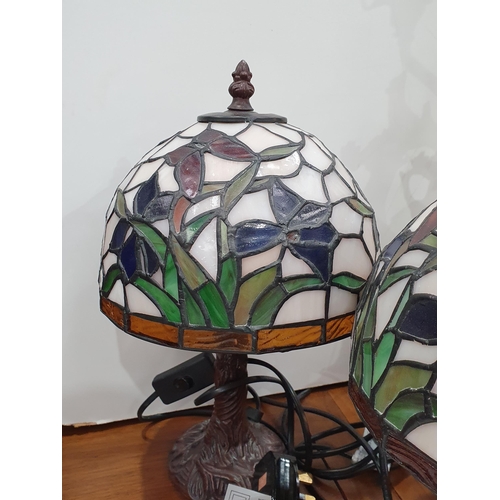 580 - A pair of Table Lamps with Tiffany style leaded glass shades 1ft 1in H, a porcelain Table Lamp of tw... 