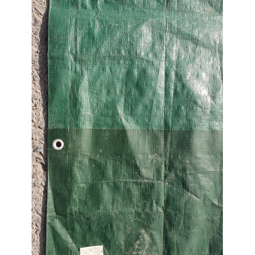 218 - A large green Tarpaulin approximately 15ft 4in x 18.6in A/F