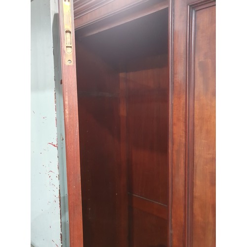 36 - A Victorian mahogany Wardrobe fitted pair of cupboard doors on plinth base 6ft 6in H x 3ft 6in W (R1... 