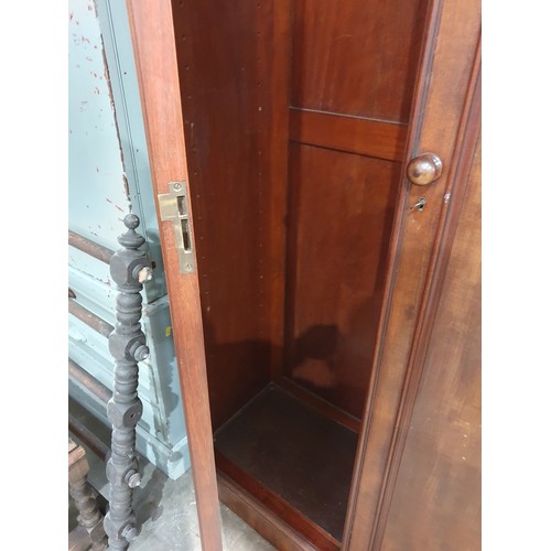 36 - A Victorian mahogany Wardrobe fitted pair of cupboard doors on plinth base 6ft 6in H x 3ft 6in W (R1... 