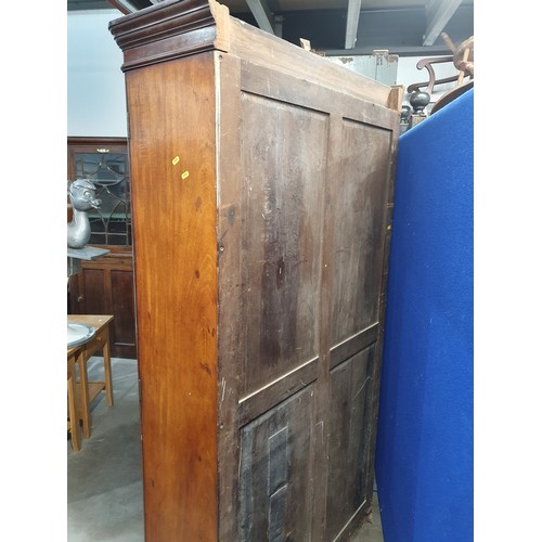 36 - A Victorian mahogany Wardrobe fitted pair of cupboard doors on plinth base 6ft 6in H x 3ft 6in W (R1... 