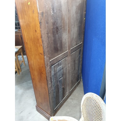 36 - A Victorian mahogany Wardrobe fitted pair of cupboard doors on plinth base 6ft 6in H x 3ft 6in W (R1... 