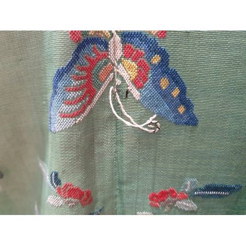 214 - A green Chinese Robe embroidered butterflies and flowers with gilt buttons. (R5)