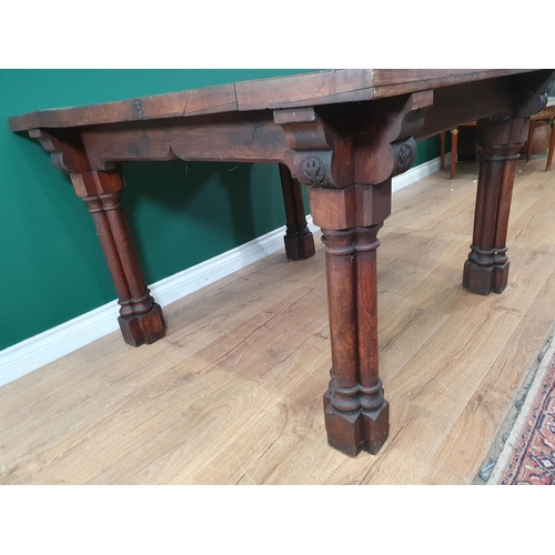 917 - An oak Library Table with five plank top raised on cluster column supports 3ft 9in W x 2ft 5in H (R4... 