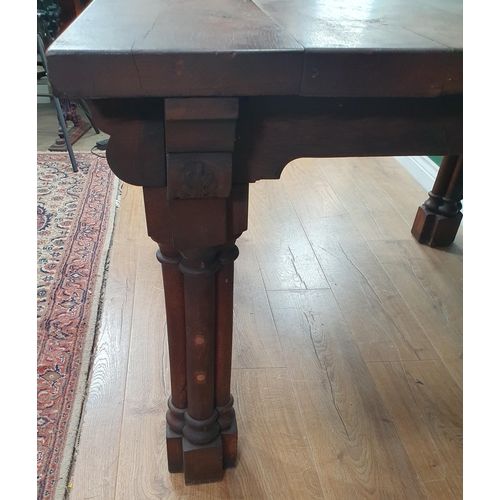 917 - An oak Library Table with five plank top raised on cluster column supports 3ft 9in W x 2ft 5in H (R4... 