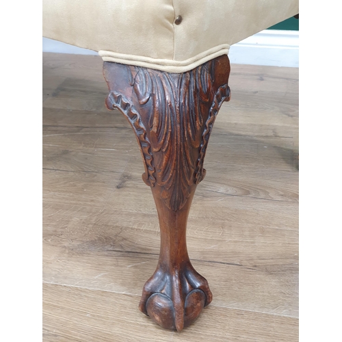 747 - A Georgian style mahogany Dressing Stool, upholstered in suede and raised on carved cabriole support... 