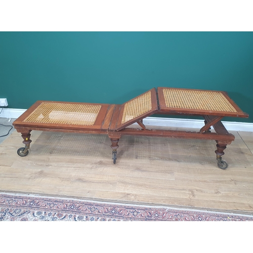 754 - A Campaign Day Bed stamped Robinson's & Sons, Ilkley, Patent, with adjustable cane panels, raised on... 