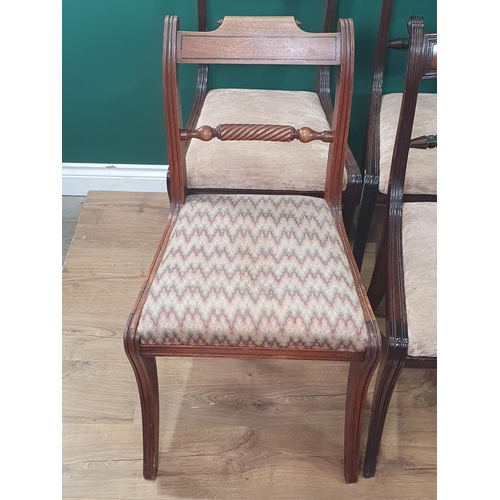 759 - A set of Eight Regency mahogany Dining Chairs, with reeded frames on sabre legs, drop in seats  Viz ... 