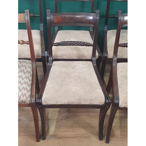 759 - A set of Eight Regency mahogany Dining Chairs, with reeded frames on sabre legs, drop in seats  Viz ... 