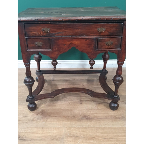 760 - A William and Mary oak Style Lowboy/Side Table fitted one long drawer with two drawers flanking the ... 