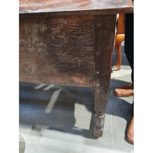 830 - A Charles II oak Dresser Base, fitted four moulded drawers on turned and squared supports and square... 