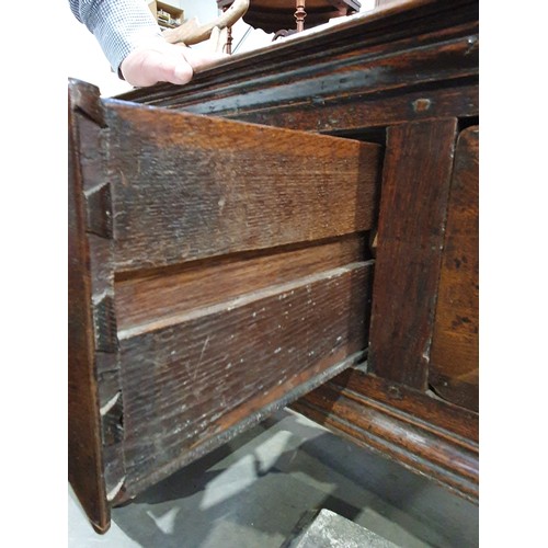 830 - A Charles II oak Dresser Base, fitted four moulded drawers on turned and squared supports and square... 