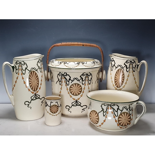 618 - A Royal Doulton Toilet Set, with medallions and ribbon designs, including a Pail and Cover with cane... 