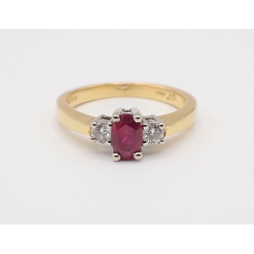201 - A Ruby and Diamond three stone Ring claw-set oval-cut ruby between two brilliant-cut diamonds, total... 