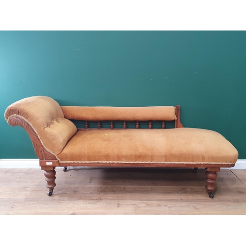 705 - A Victorian oak framed Chaise Lounge with gold upholstery 5ft 10in L x 2ft H (R3)