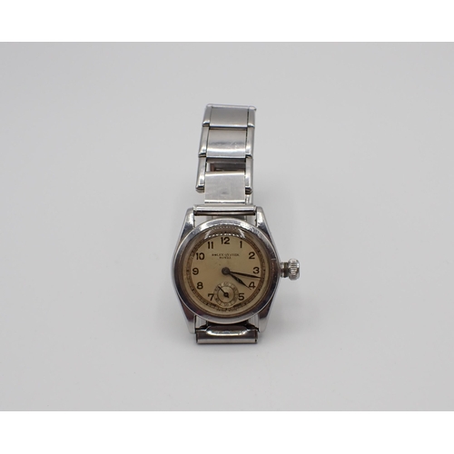 162 - A Rolex Oyster Royal Wristwatch the cream dial with arabic numerals and subsidiary seconds dial in s... 