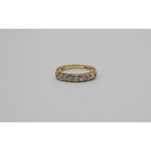 171 - A Diamond seven stone Ring pavé-set brilliant-cut stones in 18ct gold, ring size L