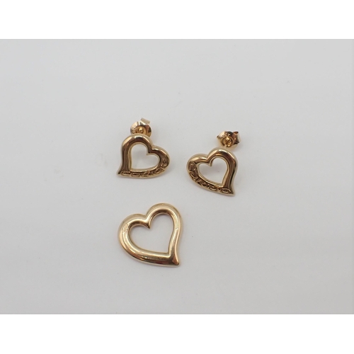 174 - A 9ct gold heart shaped Pendant engraved 'Cariad' together with matching Earrings, approx 5.40gms