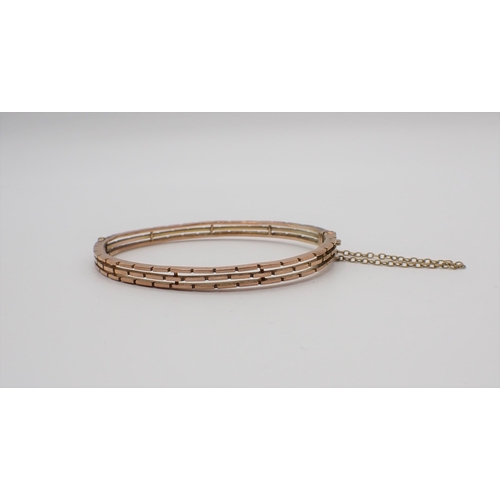 190 - A 9ct gold hinged openwork Bracelet, approx 11gms