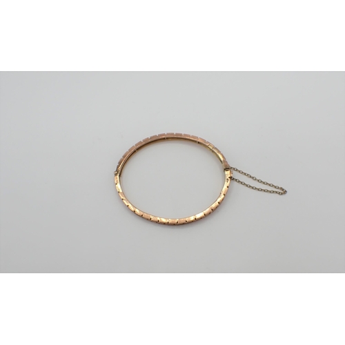 190 - A 9ct gold hinged openwork Bracelet, approx 11gms