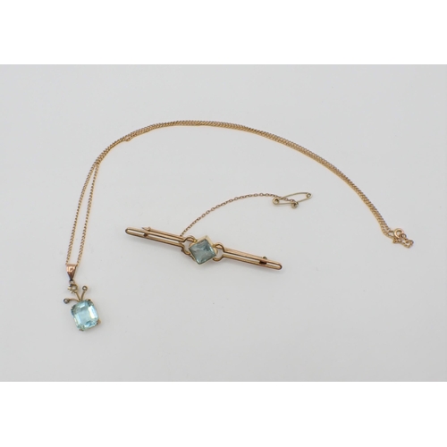 211 - An Edwardian Pendant set seed pearls and blue paste in 9ct gold om fine chain and a 9ct Bar Brooch s... 