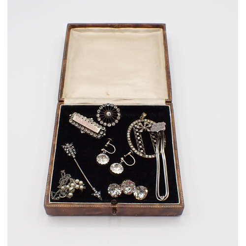 227 - A small collection of white metal and silver paste-set Jewellery including; Jabot Pin, oval Pendant,... 