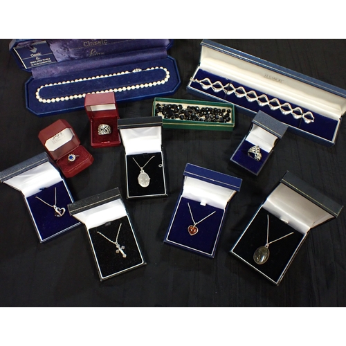 230 - A collection silver Pendants, Bracelets, Rings etc