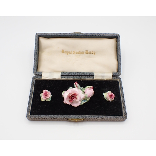 236 - Two vintage Brooches and a Royal Crown Derby porcelain rose Brooch with matching Ear Clips