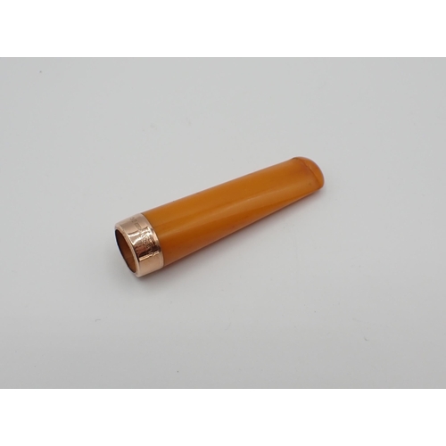 244 - A bakelite Cigar Holder with 9ct gold mount