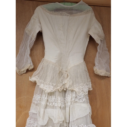 247 - A 19th Century Wedding Dress together with satin shoes and metal framed embroidered silk bag