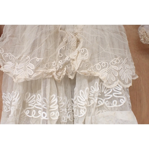 247 - A 19th Century Wedding Dress together with satin shoes and metal framed embroidered silk bag