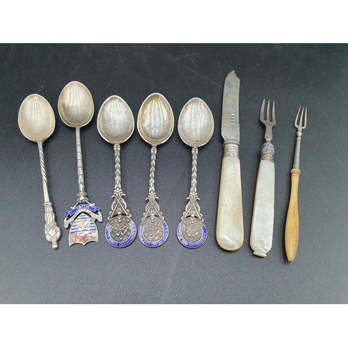 106 - Three George V silver and blue enamel Llandrindod Golf Club Spoons, Birmingham 1912-14, a Rhyl Souve... 